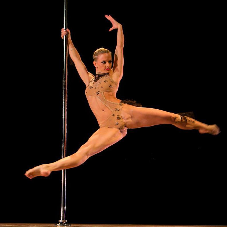 Naked female pole dancer